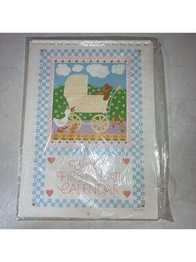Vintage “Baby’s First Year Calendar” new old stock in the original packaging